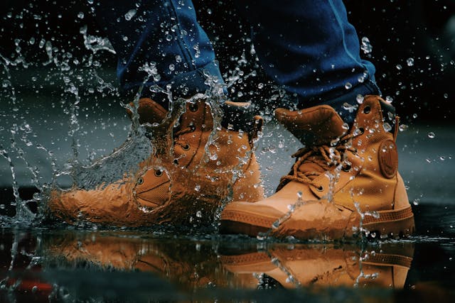 work boots splashing in water